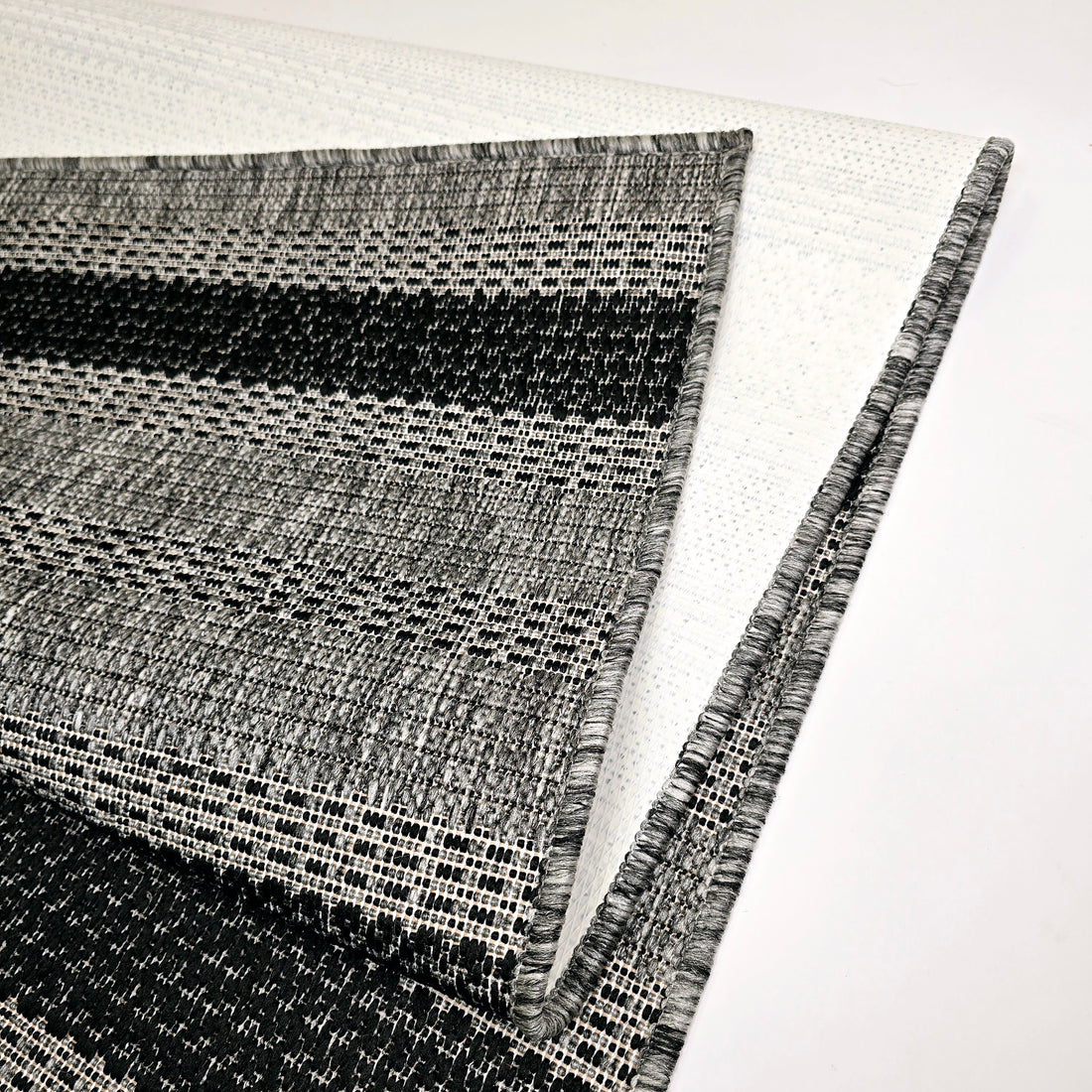 Sileäksi kudottu Dawn Foam Raita Harmaa/Musta