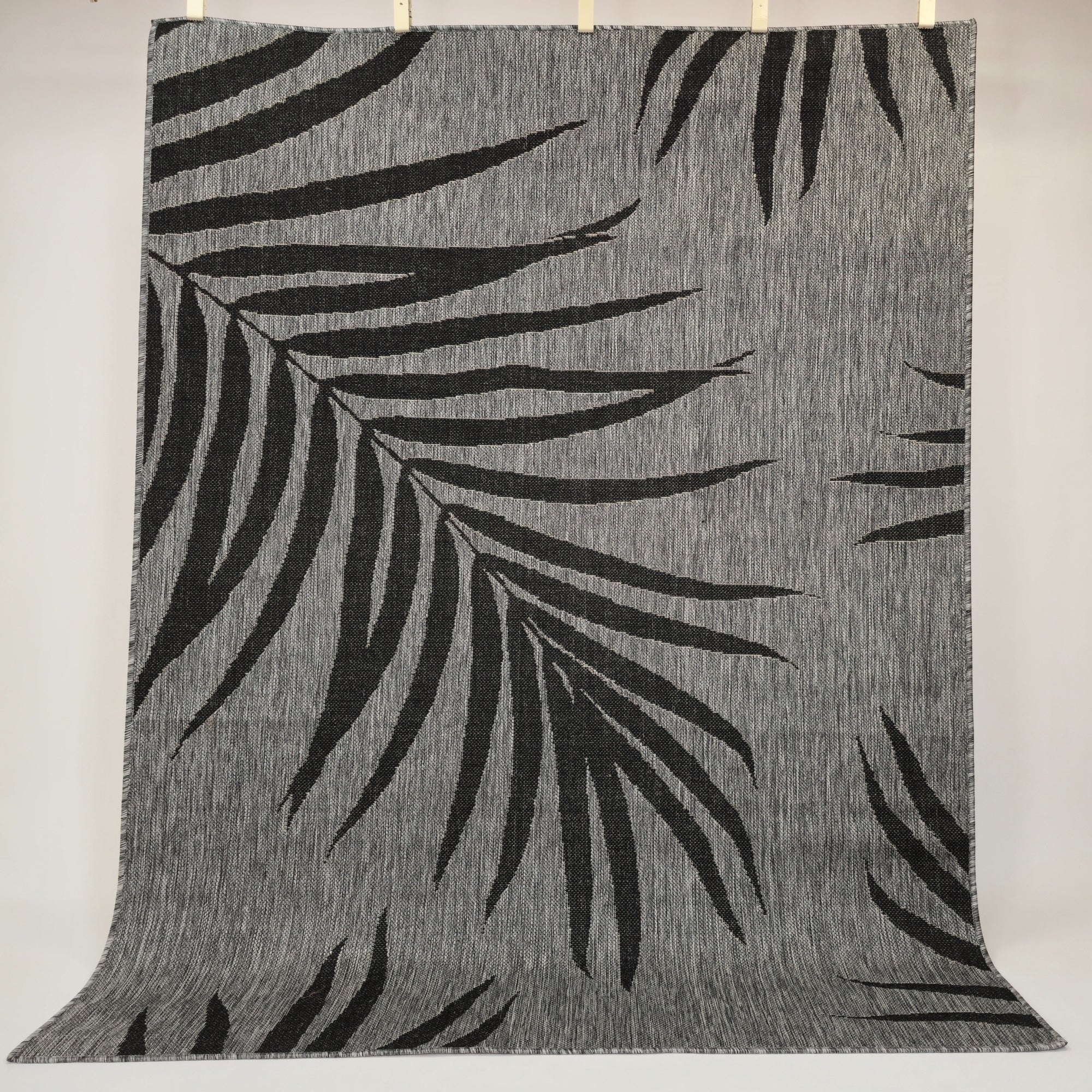 sileäksi kudottu matto lehti pääkuva